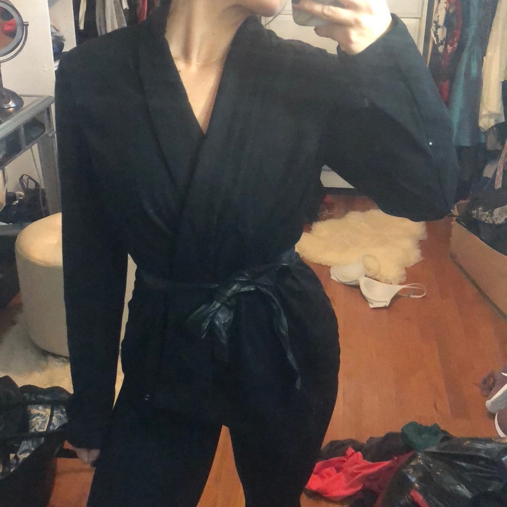 Black jacket with leather belt